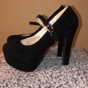 Black suede Mary Jane platforms